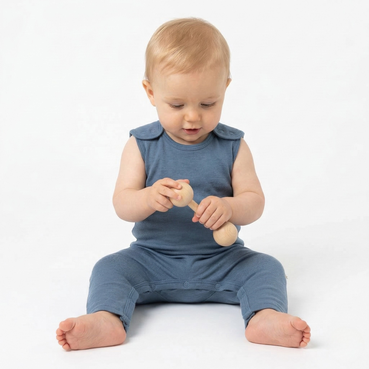 Romper (playsuit) made of 100% organic fine merino with shoulder buttons