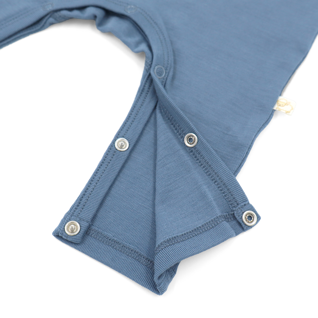 Romper (playsuit) made of 100% organic fine merino with shoulder buttons