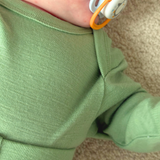 Боди с дълъг ръкав и обло деколте от 100% органична мериносова вълна